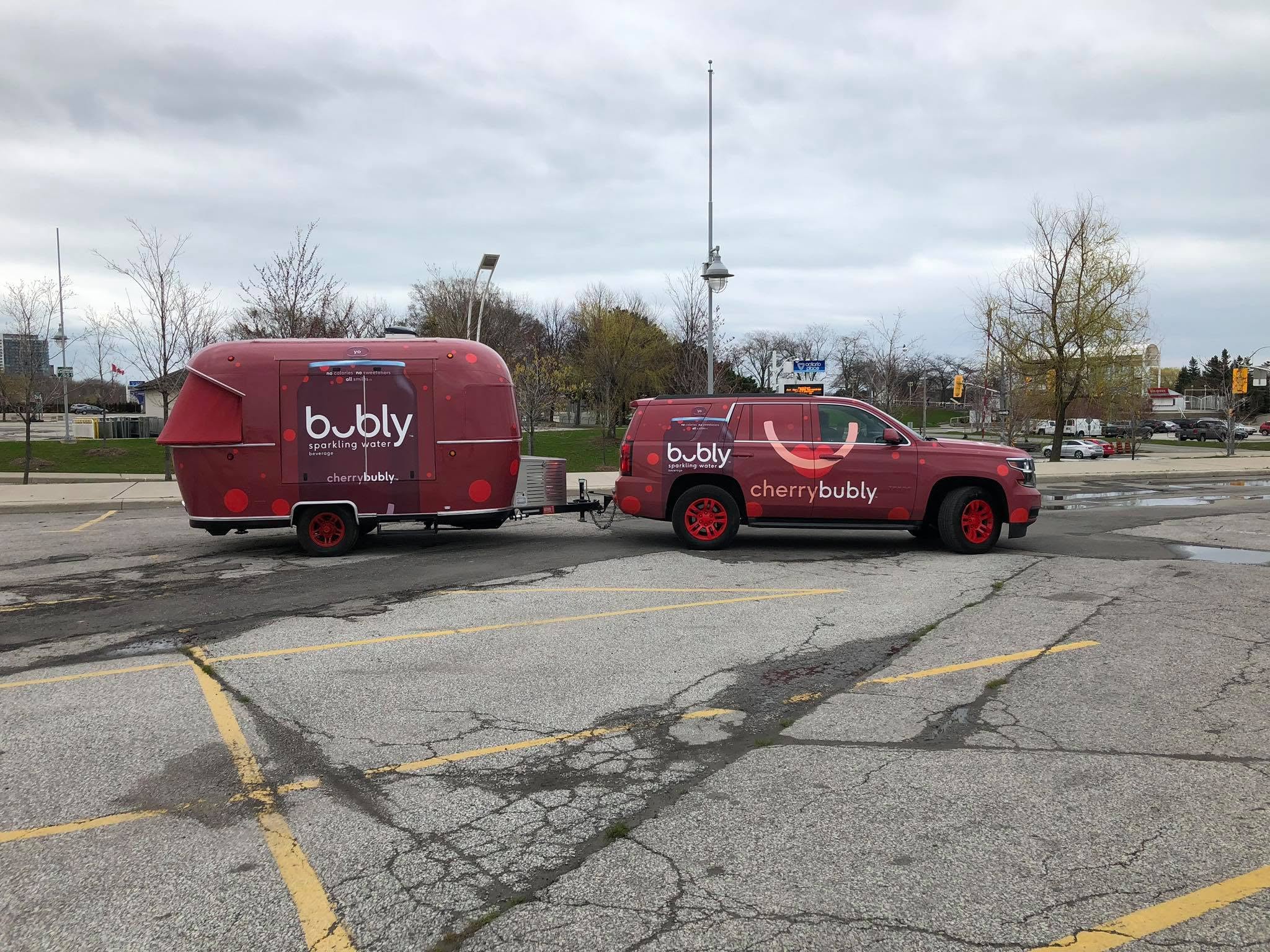 Bubly Cherry Bubly branded trailer and SUV