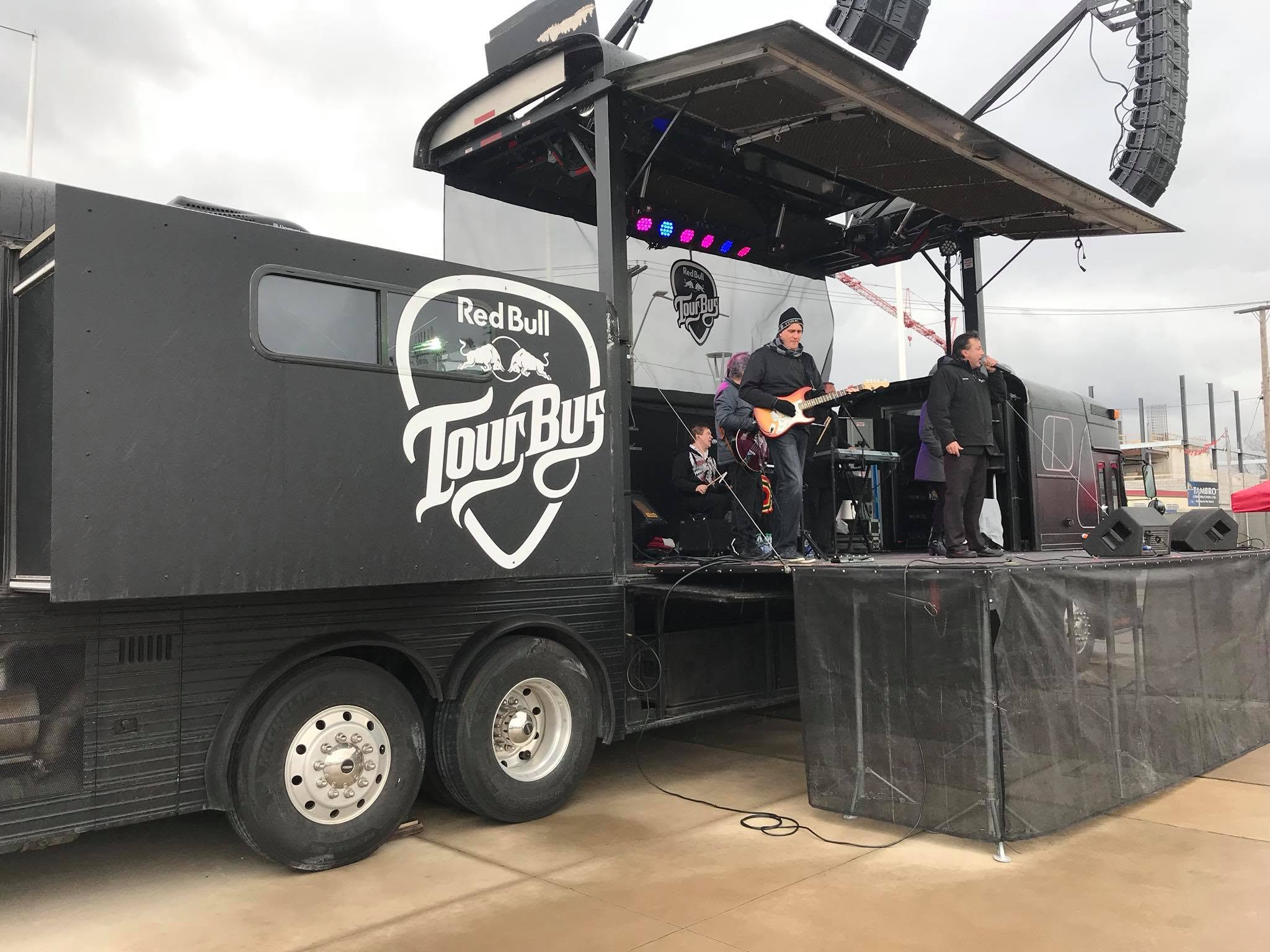 Red Bull Tour Bus set up with live band performing