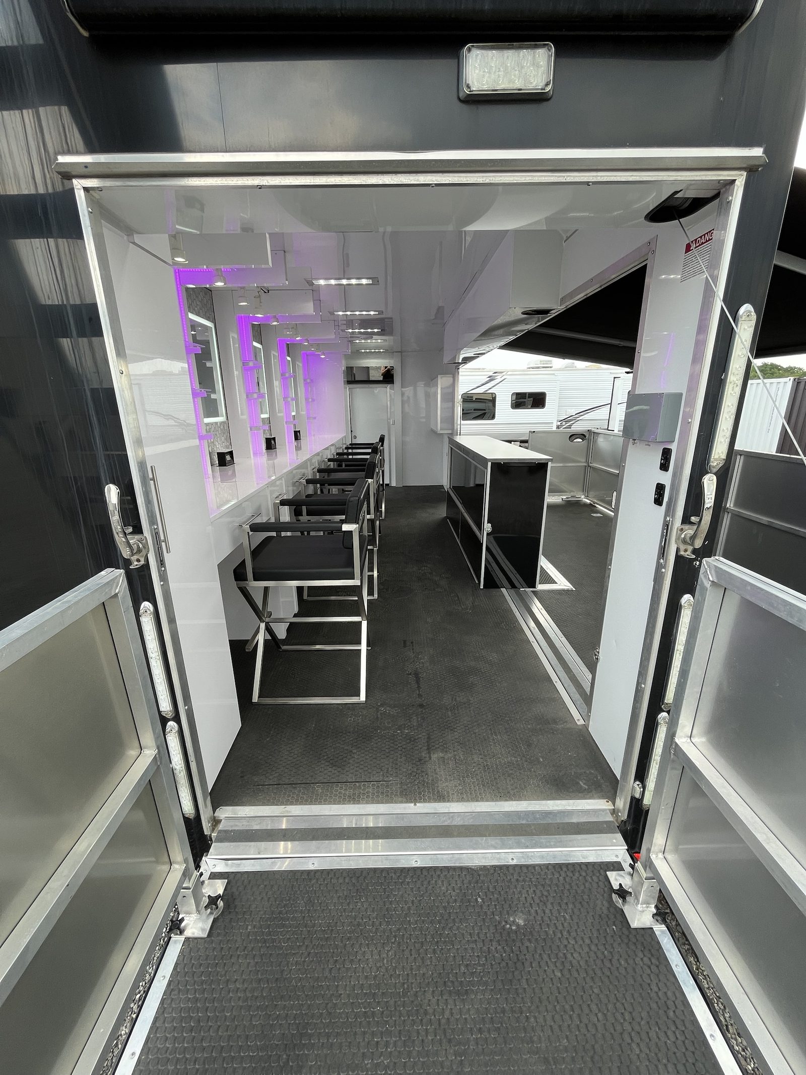 View into the glam trailer interior from the entrance